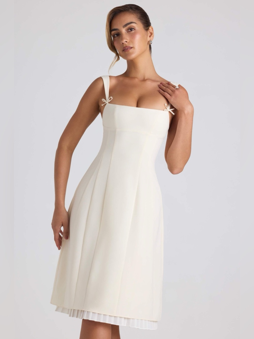 Oh Polly Isadora Bow-detailed pleaded A-line Midi Dress in Ivory - Picture 2 of 7
